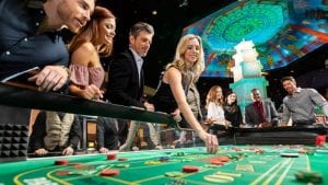people around a roulette table 